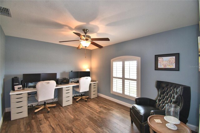 186 Viola Dr, Auburndale, FL 33823 - home office featuring dark wood-style floors, a ceiling fan, and baseboards