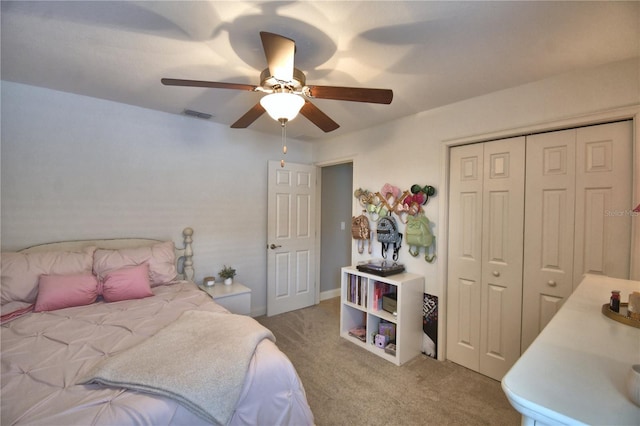 186 Viola Dr, Auburndale, FL 33823 - bedroom featuring light colored carpet, a closet, and ceiling fan