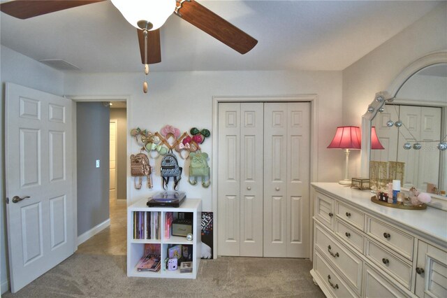 186 Viola Dr, Auburndale, FL 33823 - bedroom with carpet flooring, a closet, ceiling fan, and baseboards