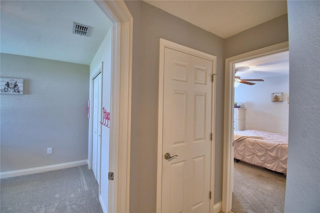 186 Viola Dr, Auburndale, FL 33823 - hallway with carpet floors and baseboards