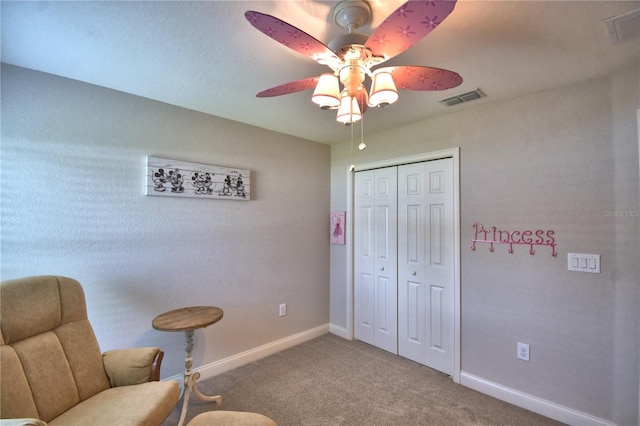 186 Viola Dr, Auburndale, FL 33823 - sitting room featuring ceiling fan, carpet flooring, and baseboards
