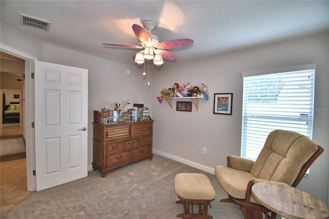 186 Viola Dr, Auburndale, FL 33823 - sitting room with ceiling fan, light colored carpet, and baseboards
