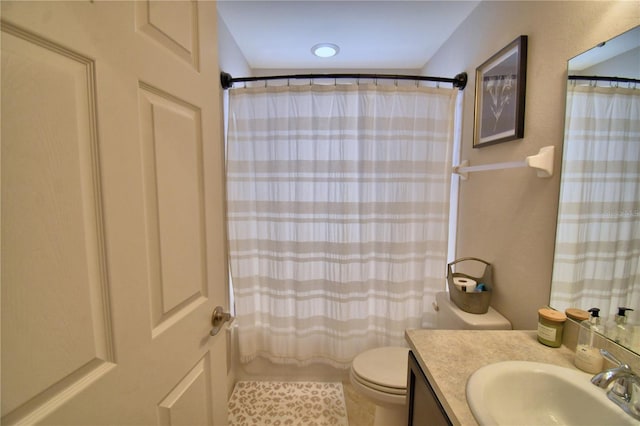 186 Viola Dr, Auburndale, FL 33823 - bathroom with toilet, vanity, and a shower with shower curtain