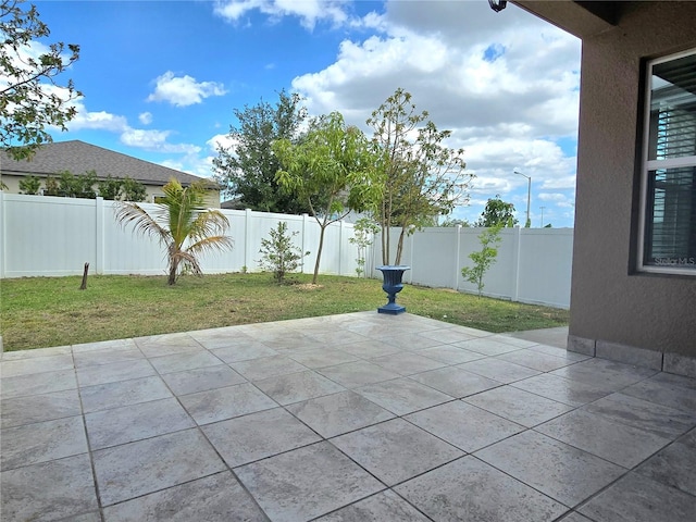 view of patio with a fenced backyard