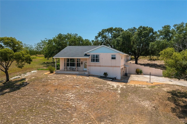 2390 Lake Easy Rd, Babson Park, FL 33827 - view of front of home with covered porch and driveway