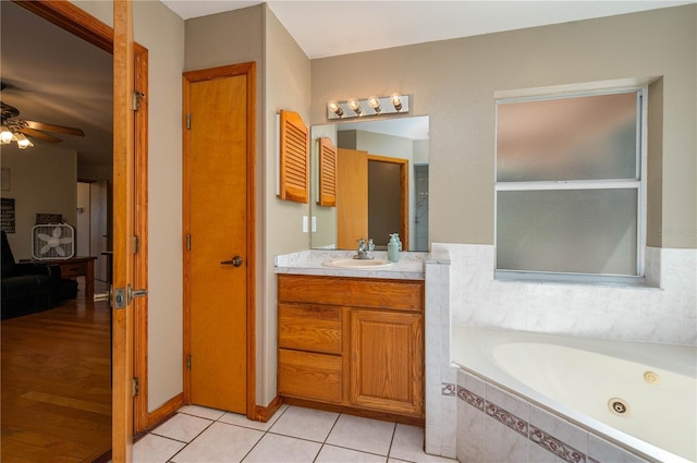 2390 Lake Easy Rd, Babson Park, FL 33827 - full bathroom with a jetted tub, a ceiling fan, tile patterned floors, and vanity