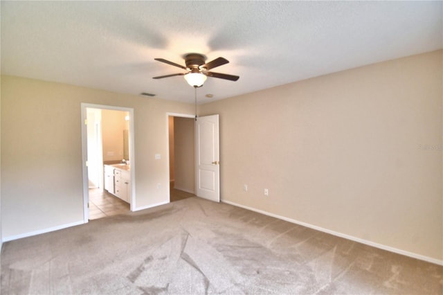 3430 Hilson Dr, Lakeland, FL 33812 - unfurnished bedroom with light carpet, visible vents, and baseboards