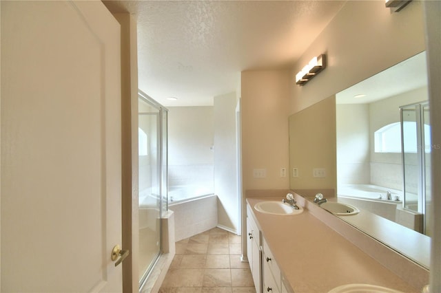 3430 Hilson Dr, Lakeland, FL 33812 - bathroom with a shower stall, double vanity, a garden tub, and a sink