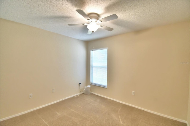 3430 Hilson Dr, Lakeland, FL 33812 - unfurnished room featuring light carpet, a ceiling fan, and baseboards