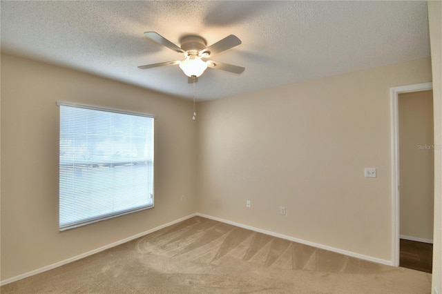3430 Hilson Dr, Lakeland, FL 33812 - spare room featuring carpet floors, a textured ceiling, baseboards, and ceiling fan