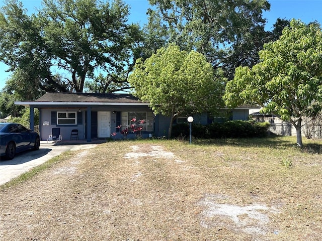 single story home featuring a porch