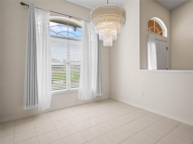 530 Greenway Dr, Lake Wales, FL 33898 - unfurnished dining area with a healthy amount of sunlight, baseboards, and a chandelier