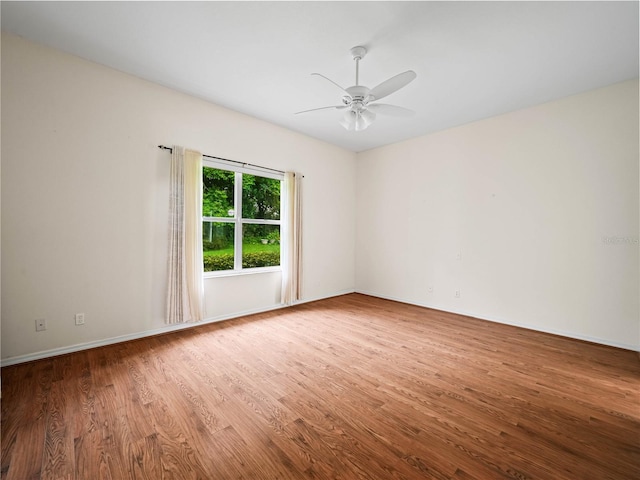 530 Greenway Dr, Lake Wales, FL 33898 - unfurnished room featuring baseboards, ceiling fan, and wood finished floors