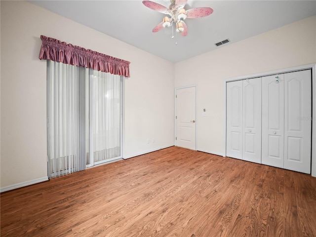 530 Greenway Dr, Lake Wales, FL 33898 - unfurnished bedroom with visible vents, baseboards, ceiling fan, and wood finished floors