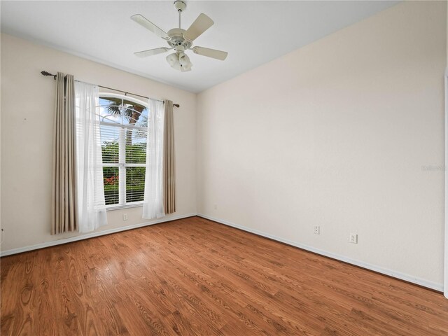 530 Greenway Dr, Lake Wales, FL 33898 - spare room featuring baseboards, a ceiling fan, and wood finished floors