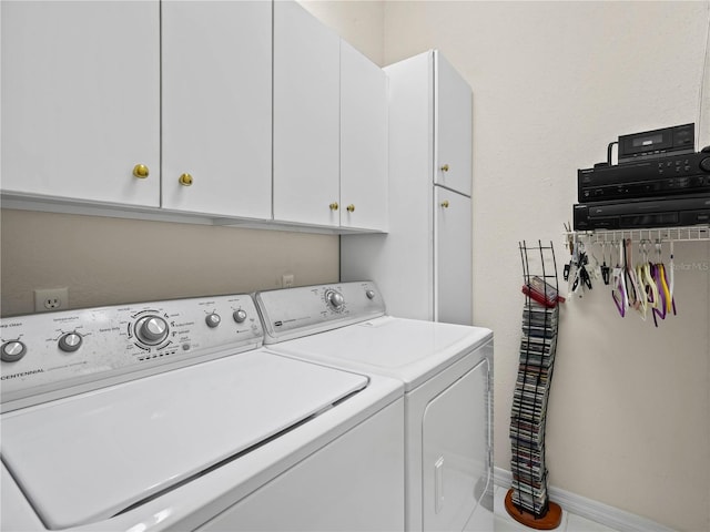 530 Greenway Dr, Lake Wales, FL 33898 - clothes washing area featuring cabinet space and washing machine and clothes dryer