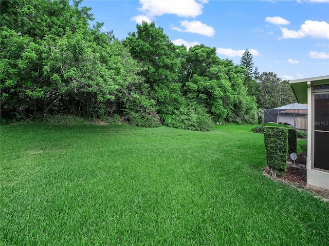 530 Greenway Dr, Lake Wales, FL 33898 - view of yard with glass enclosure