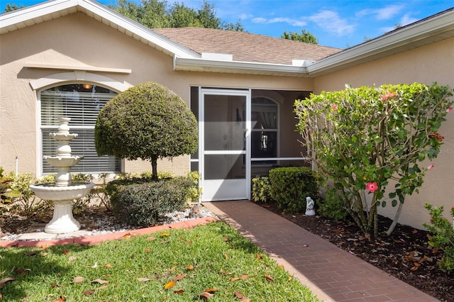 284 Lake Suzanne Dr, Lake Wales, FL 33859 - doorway to property featuring stucco siding