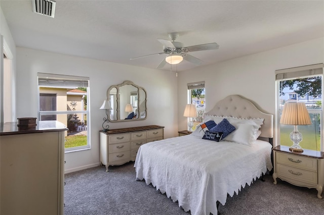 284 Lake Suzanne Dr, Lake Wales, FL 33859 - bedroom featuring carpet floors, visible vents, a ceiling fan, and baseboards
