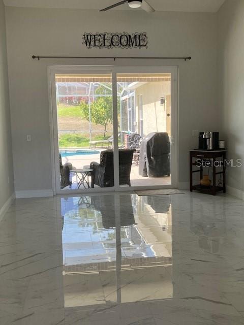1681 Waterview Loop, Haines City, FL 33844 - detailed view of baseboards and ceiling fan