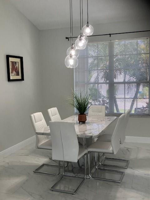 1681 Waterview Loop, Haines City, FL 33844 - dining space featuring marble finish flooring and baseboards