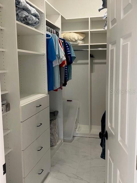 1681 Waterview Loop, Haines City, FL 33844 - spacious closet with light marble finish floors