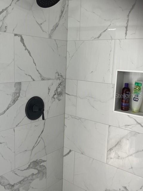 1681 Waterview Loop, Haines City, FL 33844 - bathroom view of a tile shower