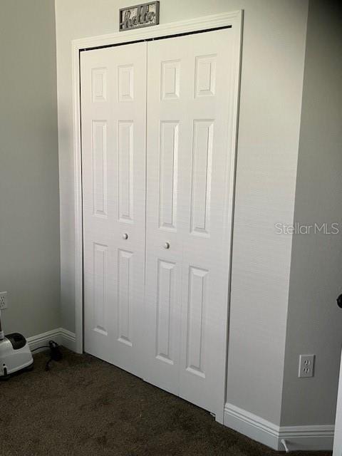 1681 Waterview Loop, Haines City, FL 33844 - detailed view of carpet and baseboards