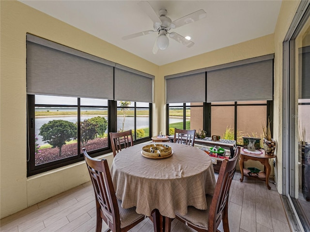 4081 Dunmore Dr, Lake Wales, FL 33859 - sunroom with a water view and wood finished floors
