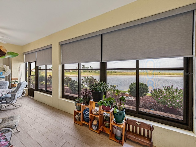 4081 Dunmore Dr, Lake Wales, FL 33859 - sunroom / solarium with a water view and wood finished floors