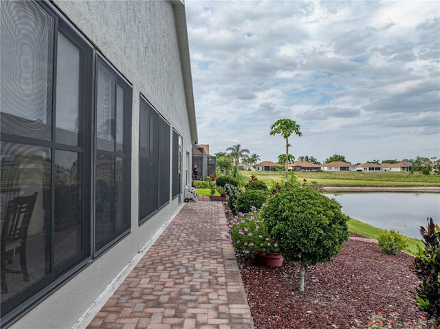 4081 Dunmore Dr, Lake Wales, FL 33859 - view of patio with a water view and a residential view
