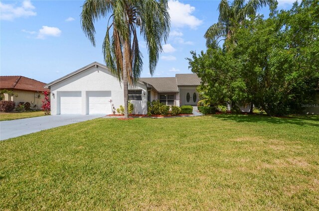 6014 Crystal View Dr, Orlando, FL 32819 - ranch-style home featuring an attached garage, concrete driveway, stucco siding, and a front lawn