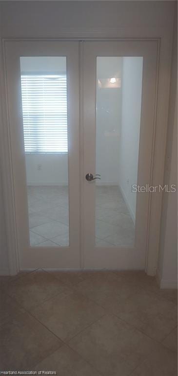 1375 Backspin Dr, Englewood, FL 34223 - interior space featuring tile patterned flooring