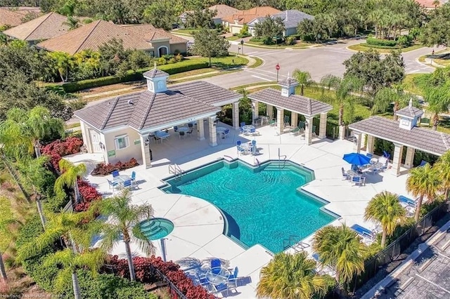 1375 Backspin Dr, Englewood, FL 34223 - pool featuring a gazebo, a pergola, a storage structure, an outdoor structure, and a patio