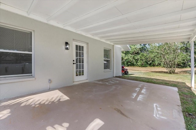 view of patio / terrace with a carport