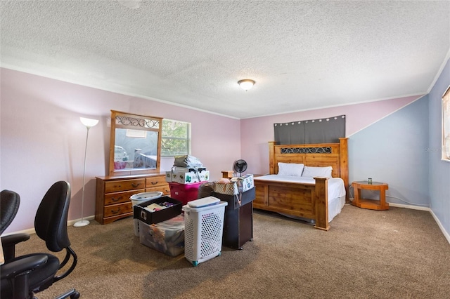 bedroom featuring baseboards, carpet, and a textured ceiling