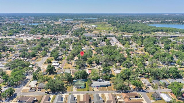 birds eye view of property with a water view and a residential view