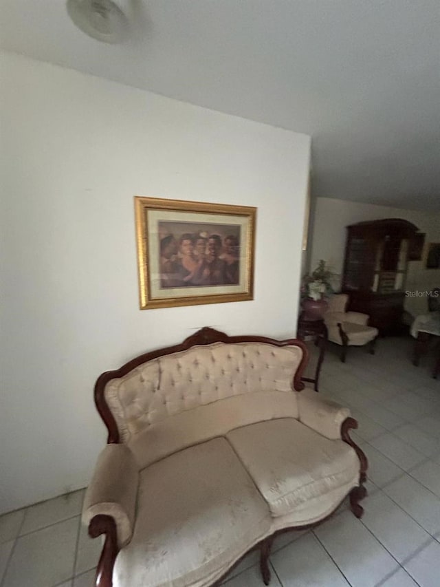 sitting room featuring tile patterned flooring