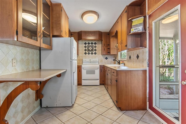 1371 Sheridan St SW, Winter Haven, FL 33880 - kitchen featuring white appliances, backsplash, open shelves, and light countertops