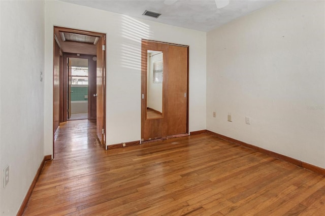 1371 Sheridan St SW, Winter Haven, FL 33880 - empty room featuring baseboards, visible vents, and light wood-style floors