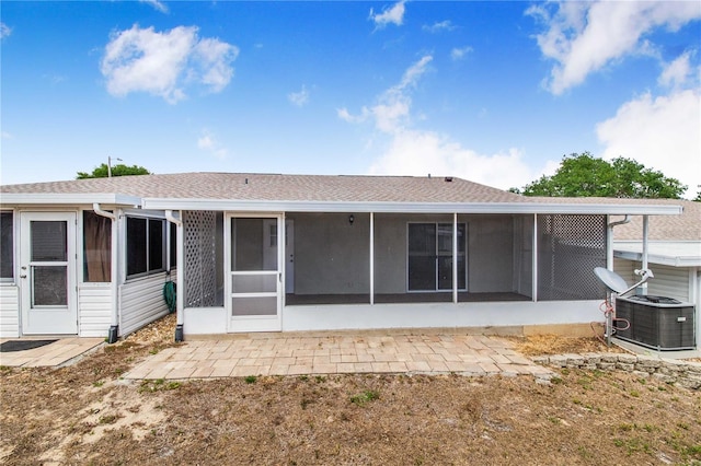 151 Winter Ridge Dr Unit 151, Winter Haven, FL 33881 - back of house featuring roof with shingles and a sunroom