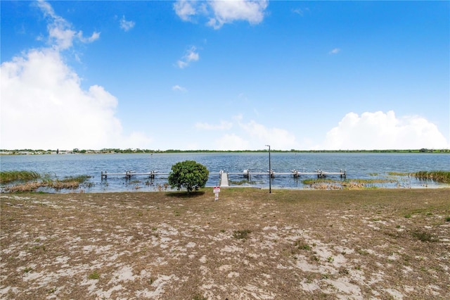 151 Winter Ridge Dr Unit 151, Winter Haven, FL 33881 - property view of water featuring a dock