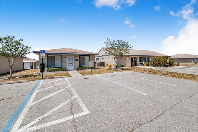 151 Winter Ridge Dr Unit 151, Winter Haven, FL 33881 - view of front of house featuring uncovered parking
