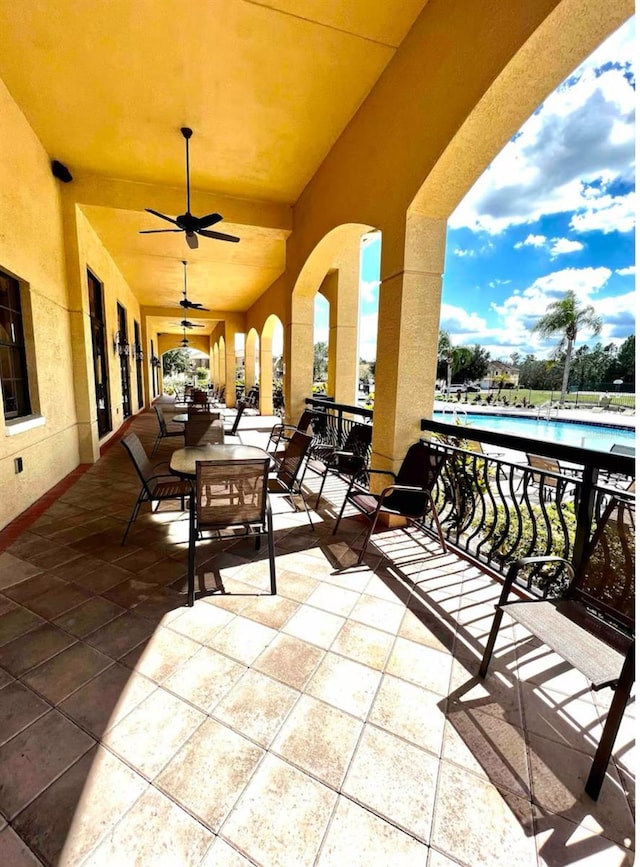 view of patio / terrace featuring a community pool