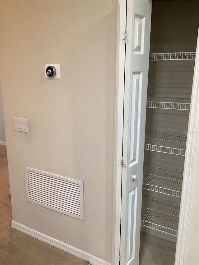 room details featuring baseboards and visible vents