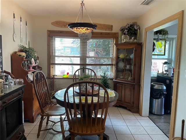 124 Palm Pl, Haines City, FL 33844 - dining space featuring light tile patterned floors