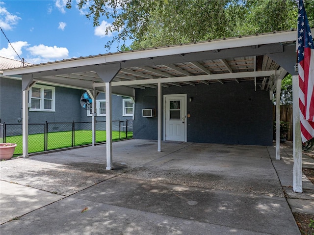803 7th St NE, Fort Meade, FL 33841 - view of parking / parking lot featuring concrete driveway and an attached carport