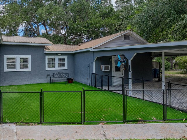 803 7th St NE, Fort Meade, FL 33841 - ranch-style home featuring a gate, stucco siding, and an attached carport