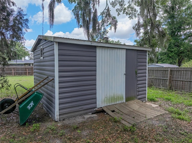 803 7th St NE, Fort Meade, FL 33841 - view of shed featuring a fenced backyard