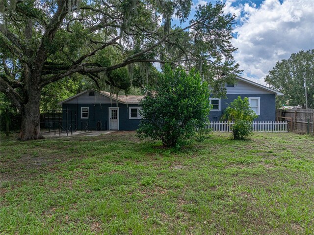 803 7th St NE, Fort Meade, FL 33841 - rear view of property featuring a patio